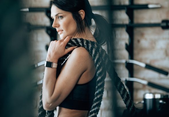 woman holding black rope