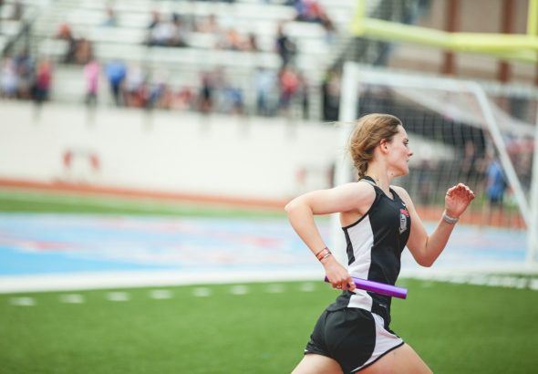 woman running on field